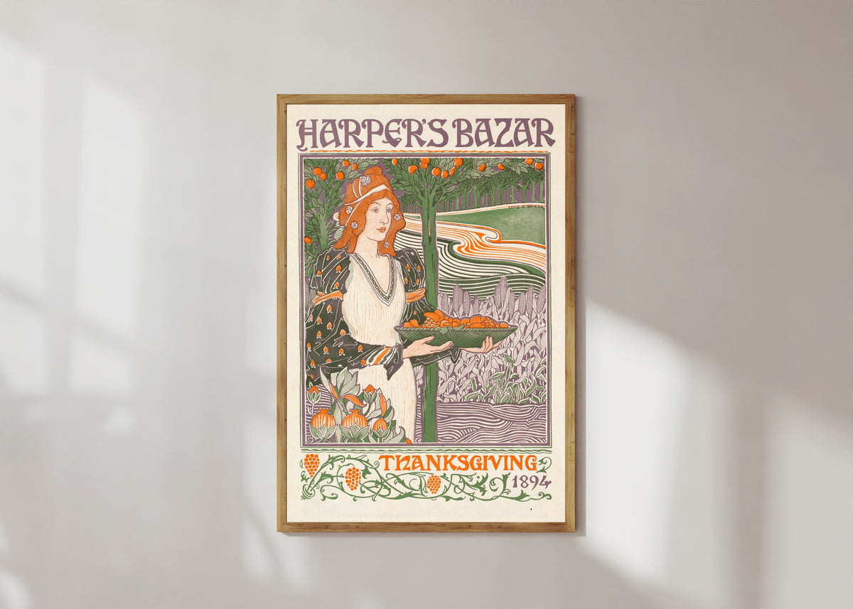 Framed art print of Harper’s Bazar, Thanksgiving 1894 by Louis Rhead, in a light wood frame on a sunlit white wall