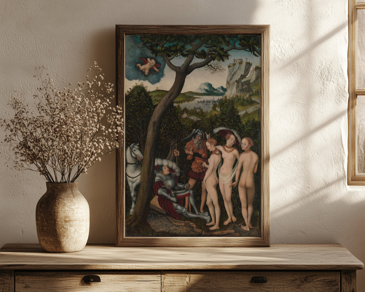 Framed art print of The Judgment of Paris by Lucas Cranach the Elder, in a dark wood frame leaning on a rustic console beside dried flowers