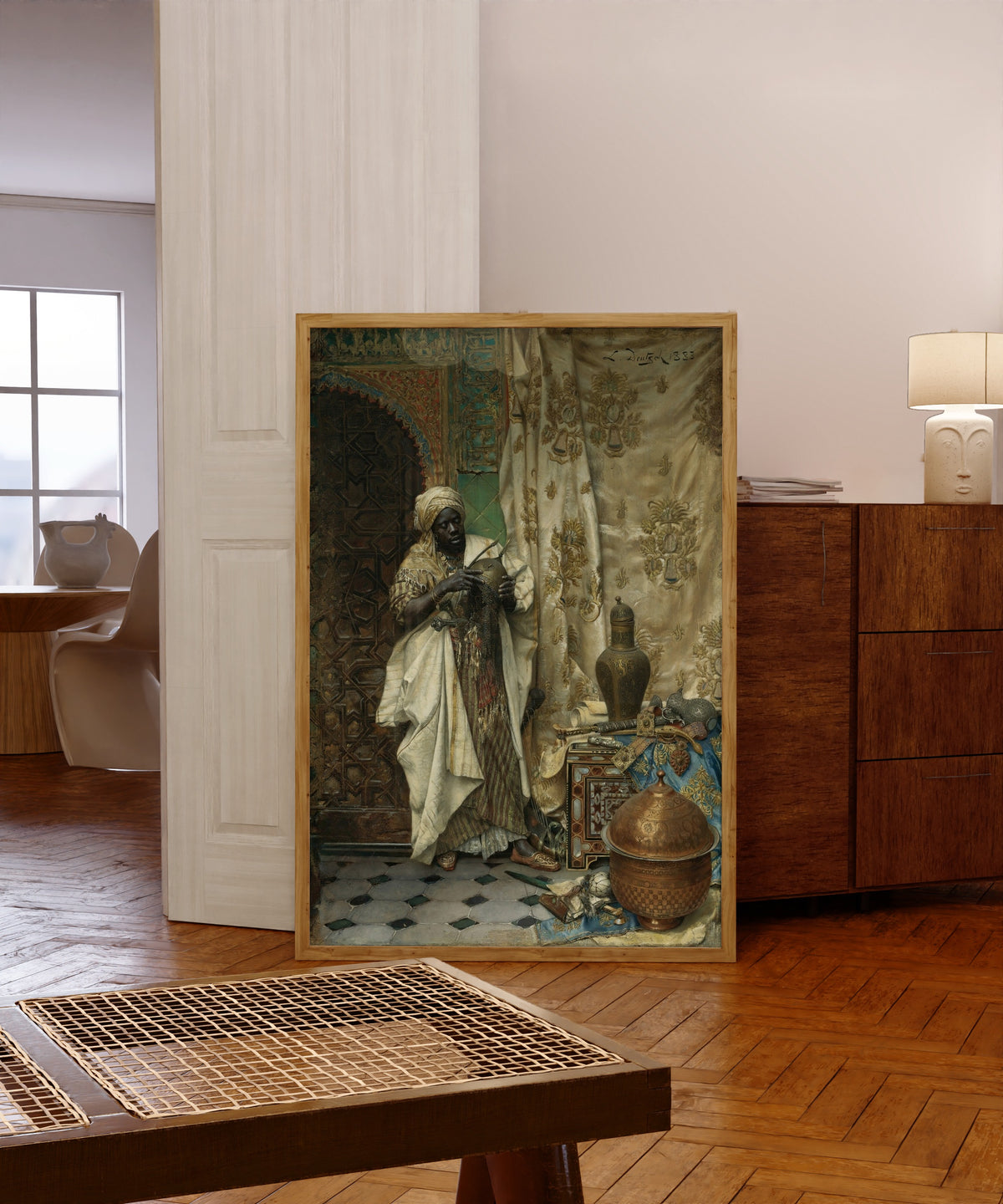 Framed art print of The Inspection by Ludwig Deutsch, in a light wood frame leaning in a warm room with a parquet floor