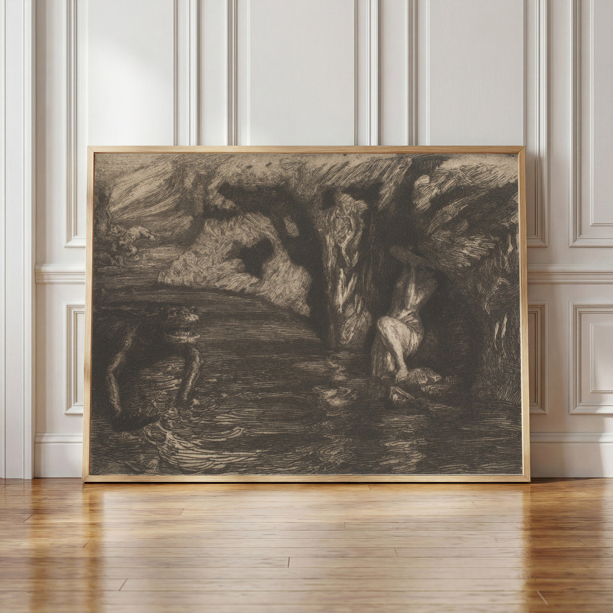 Framed art print of The Monsters by Marcel Roux, in a light wood frame leaning against a panelled white wall