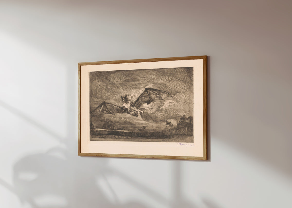 Framed art print of The Nightbeast by Marcel Roux, in a light wood frame on a sunlit white wall, seen at a slight angle
