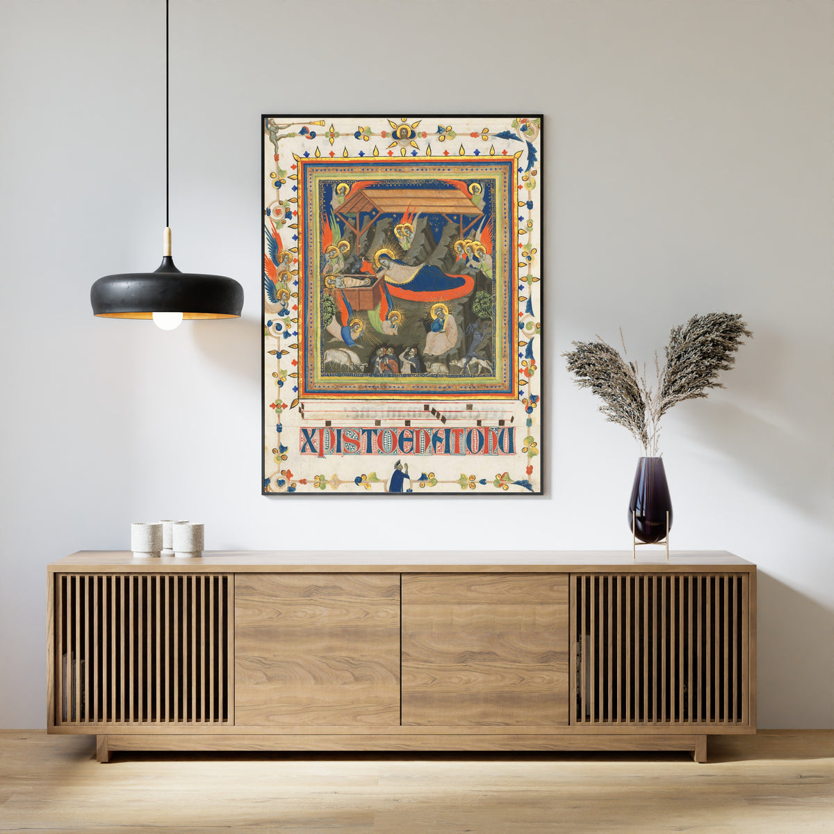 Framed art print of The Nativity with the Annunciation to the Shepherds by Master of the Dominican Effigies, above a slatted wood sideboard