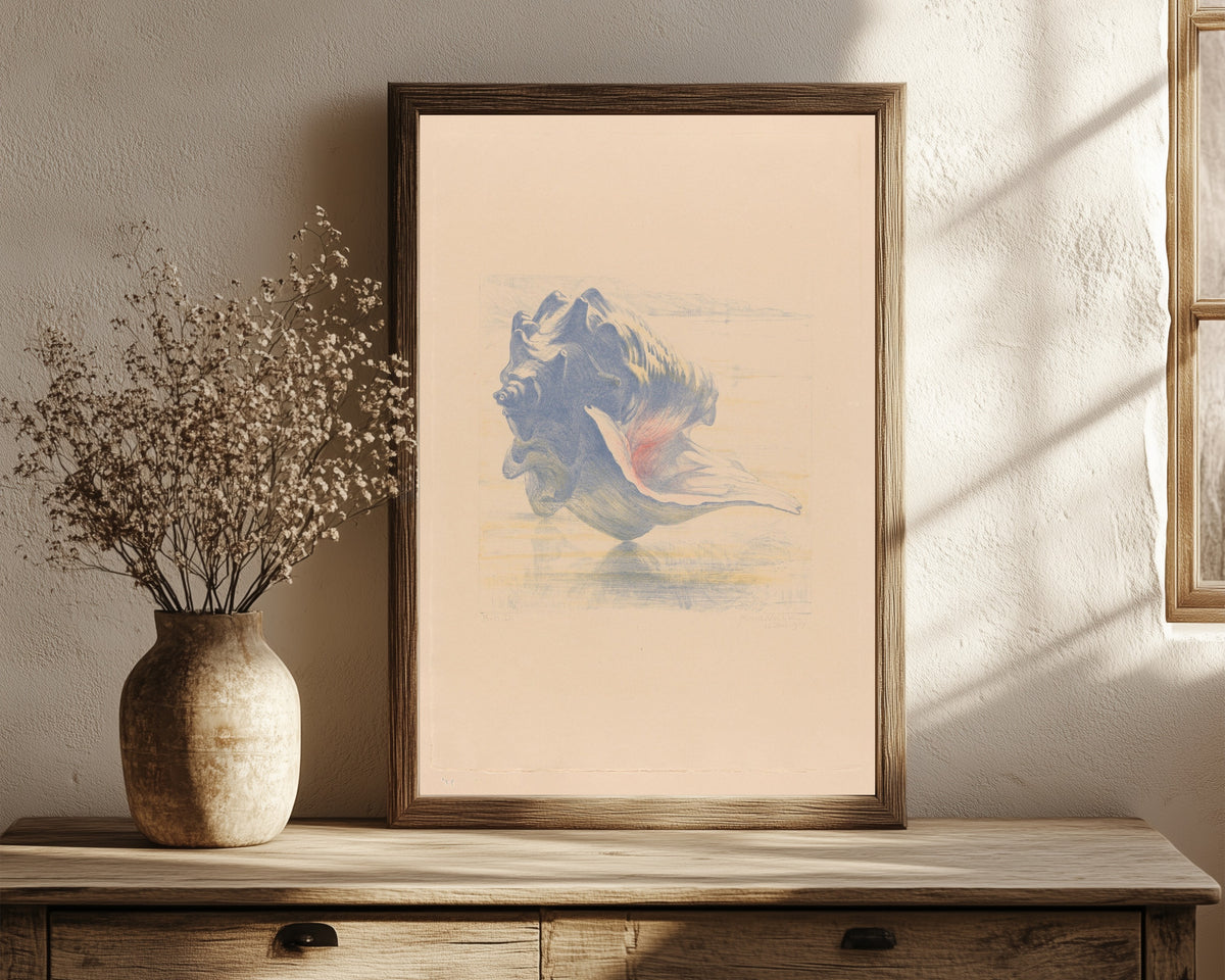 Framed art print of Seashells by Maurits van der Valk, in a dark wood frame leaning on a rustic console beside dried flowers