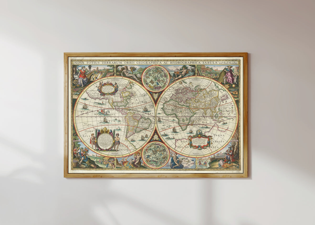 Framed art print of Nova Totius Terrarum Orbis Geographica ac Hydrographica Tabula by Melchior Tavernier II, in a light wood frame on a sunlit white wall