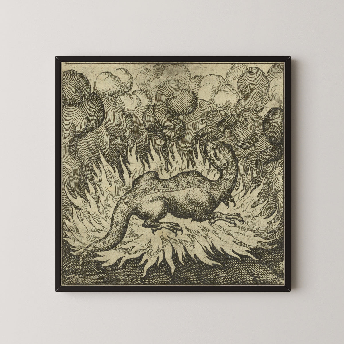 Framed art print of Atalanta Fugiens, Emblem 29: As the Salamander Lives in Fire, So Does the Stone by Michael Maier, in a black frame on a pale wall