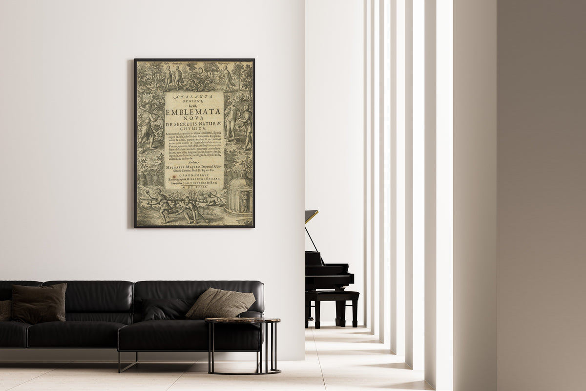 Framed art print of Atalanta Fugiens, Title Page by Michael Maier, on the wall of a minimal living room