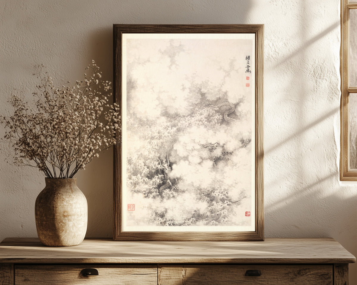 Framed art print of Dragon amid Clouds by Min Zhen, in a dark wood frame leaning on a rustic console beside dried flowers