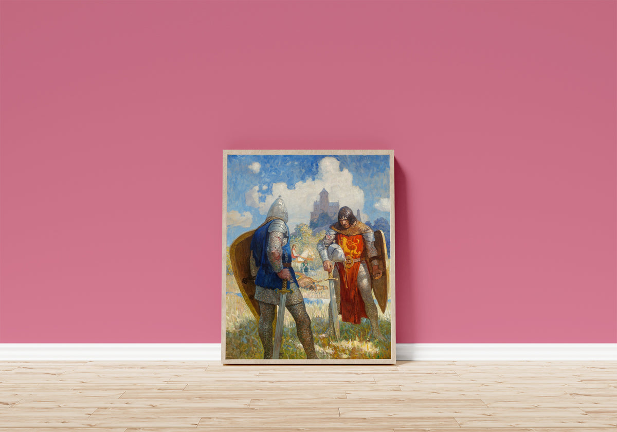 Framed art print of I am Sir Launcelot du Lake, King Ban’s son of Benwick… by N. C. Wyeth, in a light wood frame leaning on a pink wall above a wooden floor
