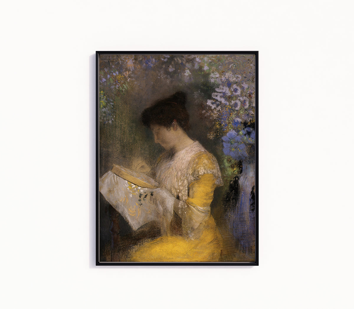 Framed art print of Madame Arthur Fontaine (Marie Escudier) by Odilon Redon, in a slim black frame on a plain white wall