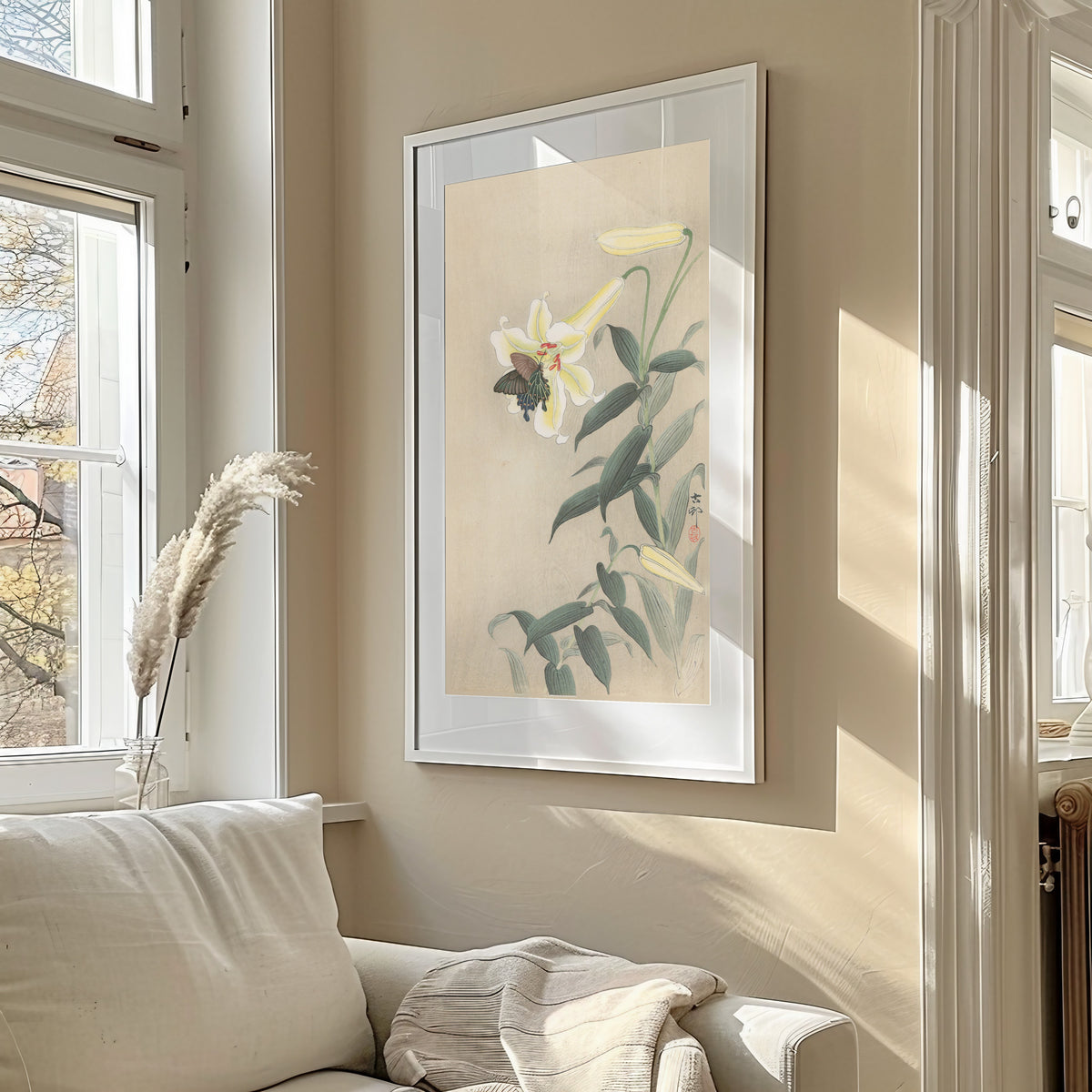 Lily and Black Swallowtail by Ohara Koson — shown framed on a wall