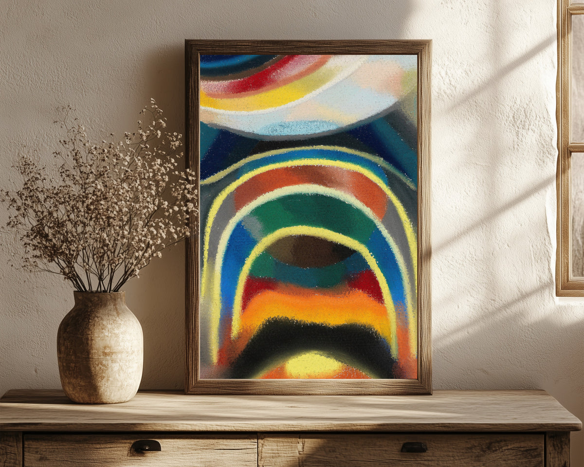 Framed art print of Lichtkreise (Kosmischer Regenbogen) (1922) by Otto Freundlich, in a dark wood frame leaning on a rustic console beside dried flowers