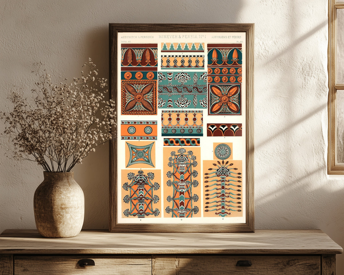 Framed art print of Nineveh & Persia No. 1 by Owen Jones, in a dark wood frame leaning on a rustic console beside dried flowers