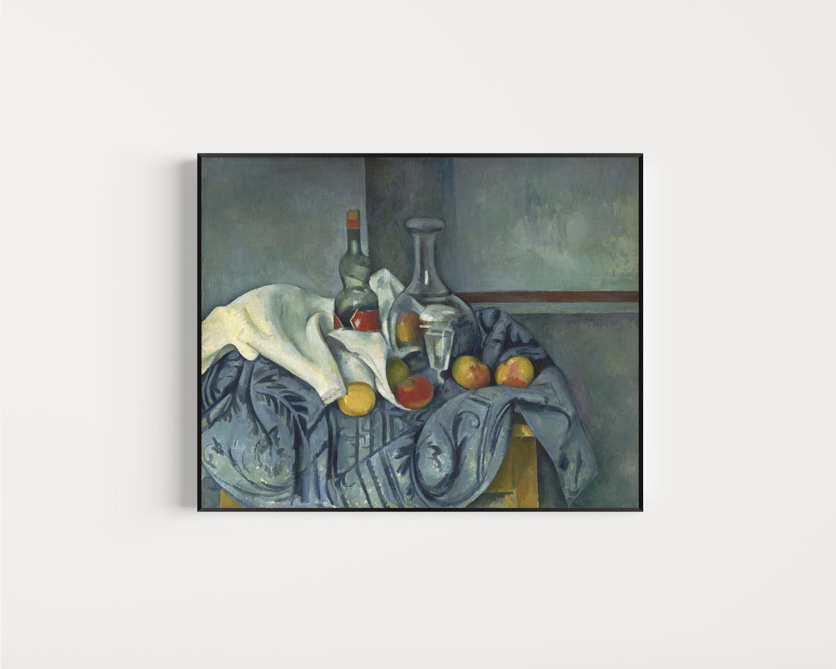 Framed art print of The Peppermint Bottle by Paul Cezanne, in a slim black frame on a plain white wall