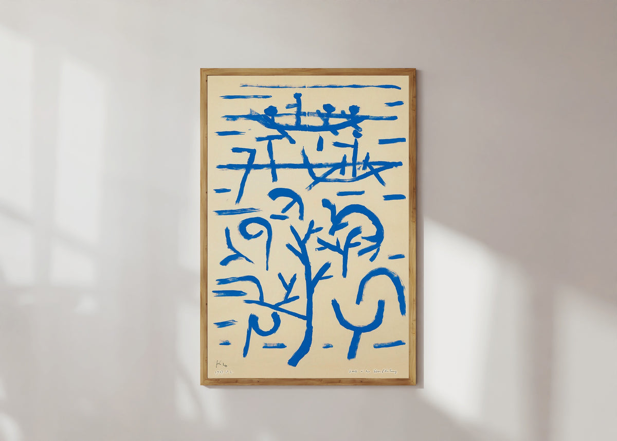 Framed art print of Boats in the Flood (Boote in der Überflutung) by Paul Klee, in a light wood frame on a sunlit white wall