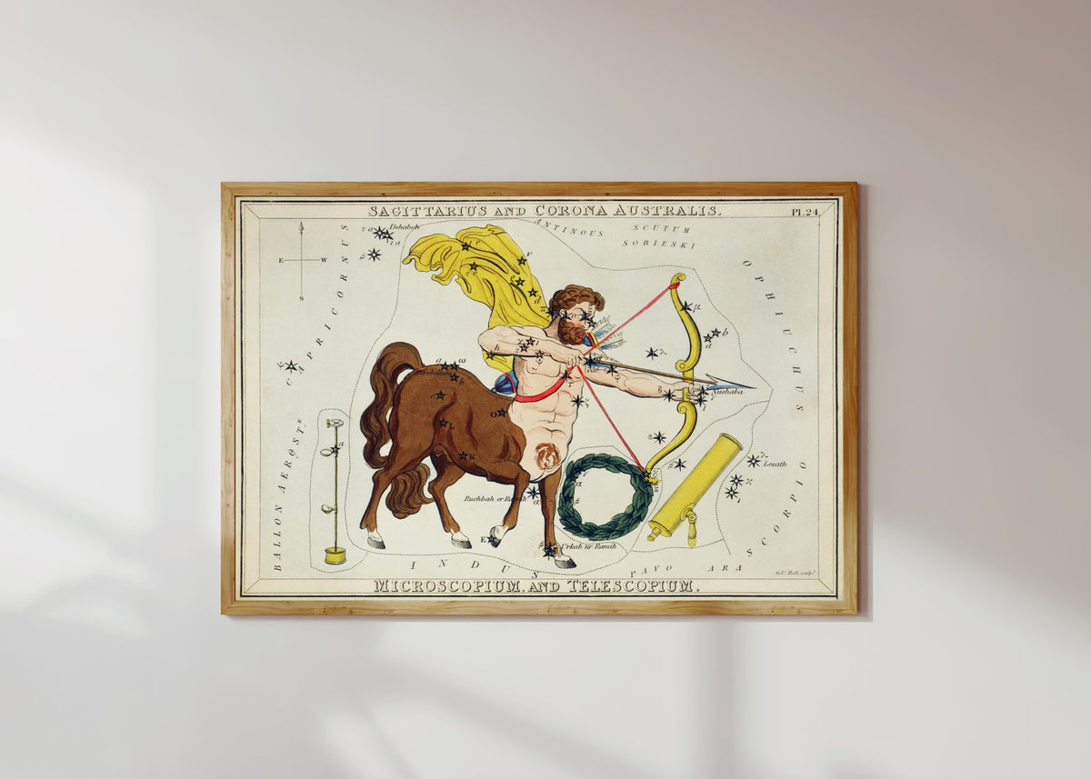 Framed art print of Sagittarius by Sidney Hall, in a light wood frame on a sunlit white wall
