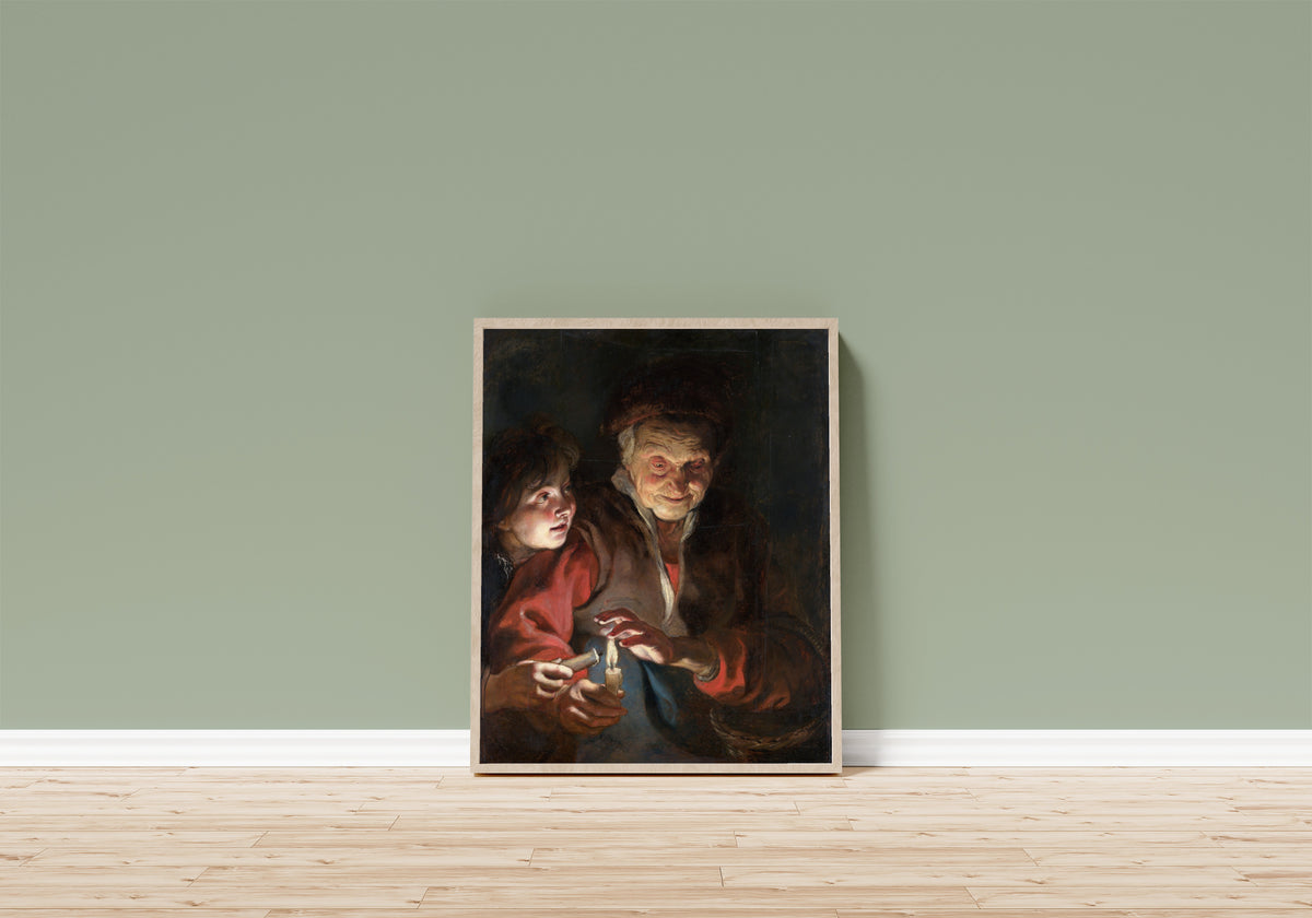 Framed art print of Old Woman and Boy with Candles by Peter Paul Rubens, in a light wood frame leaning on a sage green wall above a wooden floor