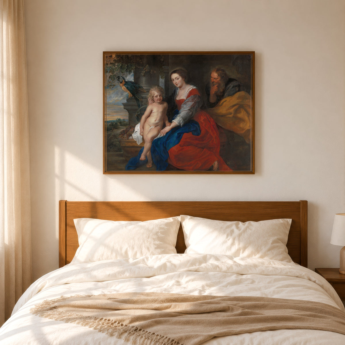 Framed art print of The Holy Family with the Parrot by Peter Paul Rubens, in a slim wood frame above a bed in a sunlit bedroom