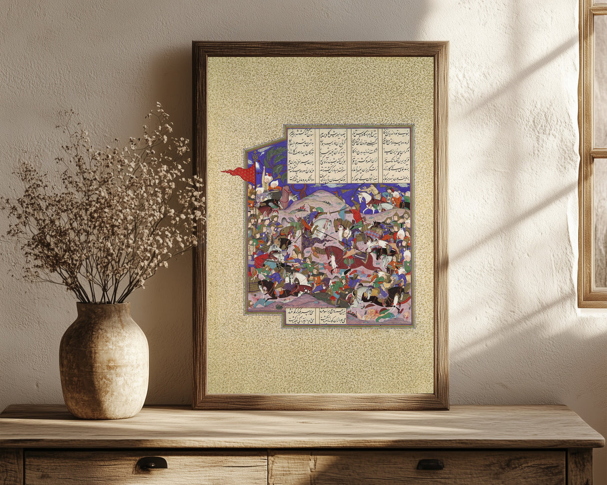 Framed art print of Shahnama of Shah Tahmasp: Bahram Recovers… by Qadimi (attributed), in a dark wood frame leaning on a rustic console beside dried flowers