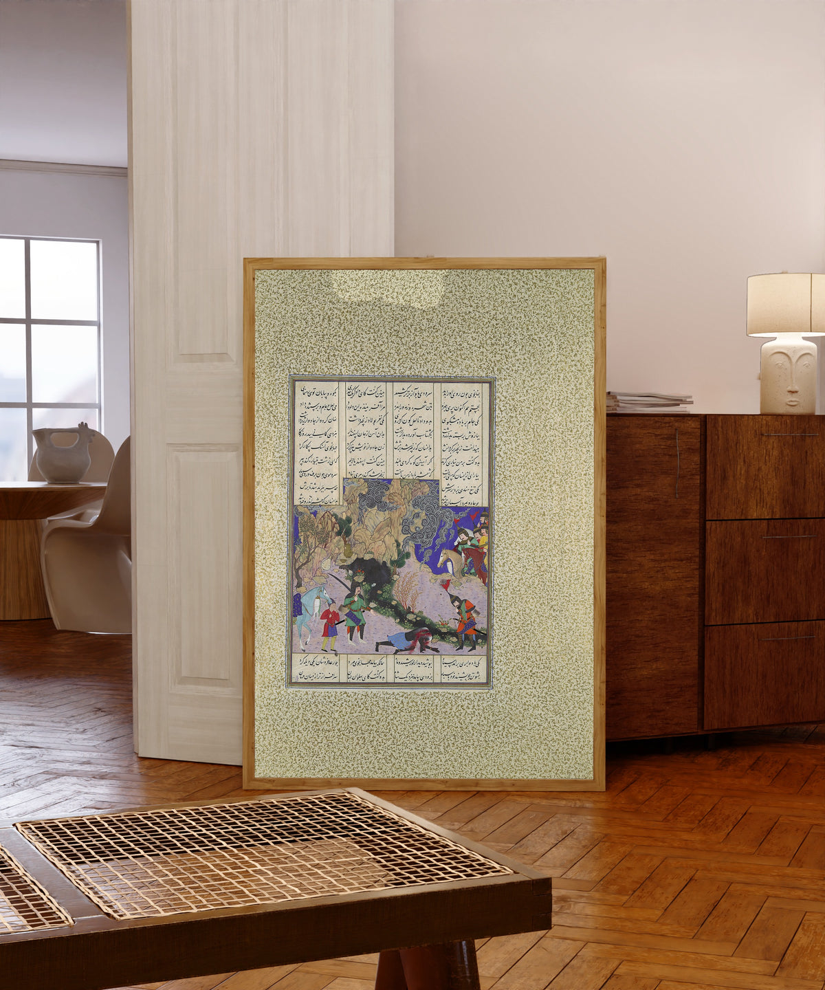 Framed art print of Shahnama of Shah Tahmasp: Isfandiyar's… by Qasim ibn Ali (attributed), in a light wood frame leaning in a warm room with a parquet floor