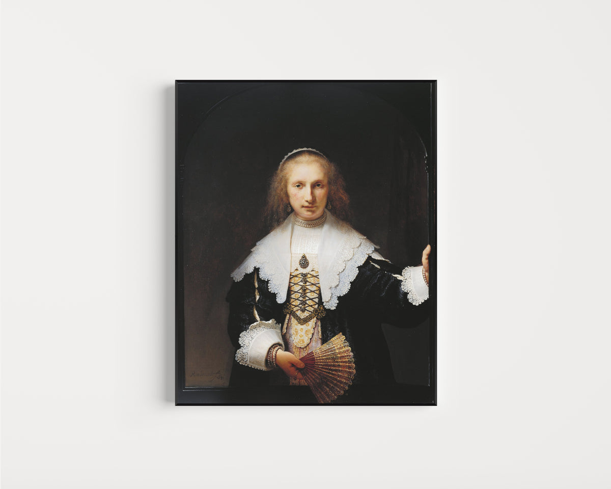 Framed art print of Agatha Bas (1611–1658) by Rembrandt van Rijn, in a slim black frame on a plain white wall