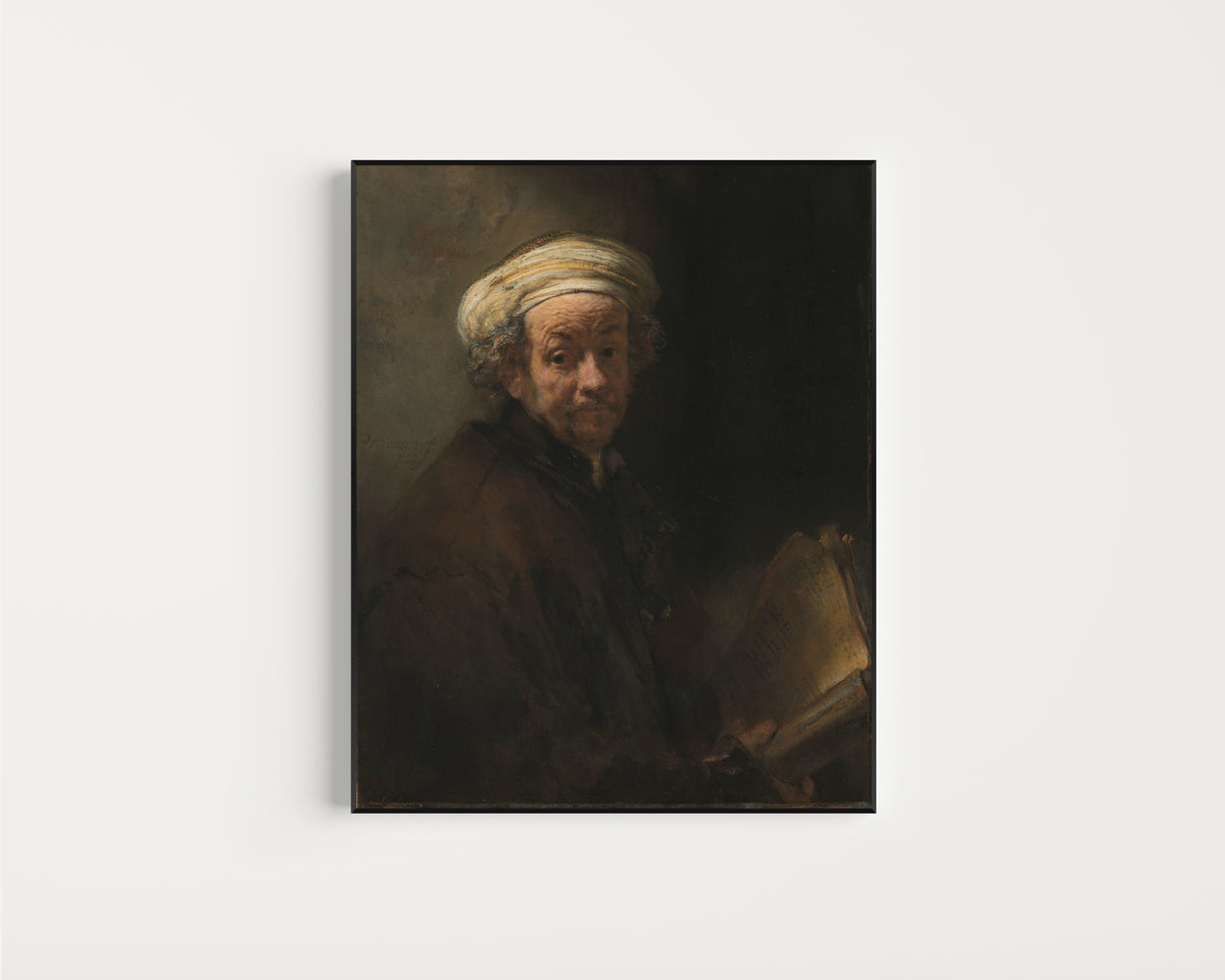 Framed art print of Self-portrait as the Apostle Paul by Rembrandt van Rijn, in a slim black frame on a plain white wall