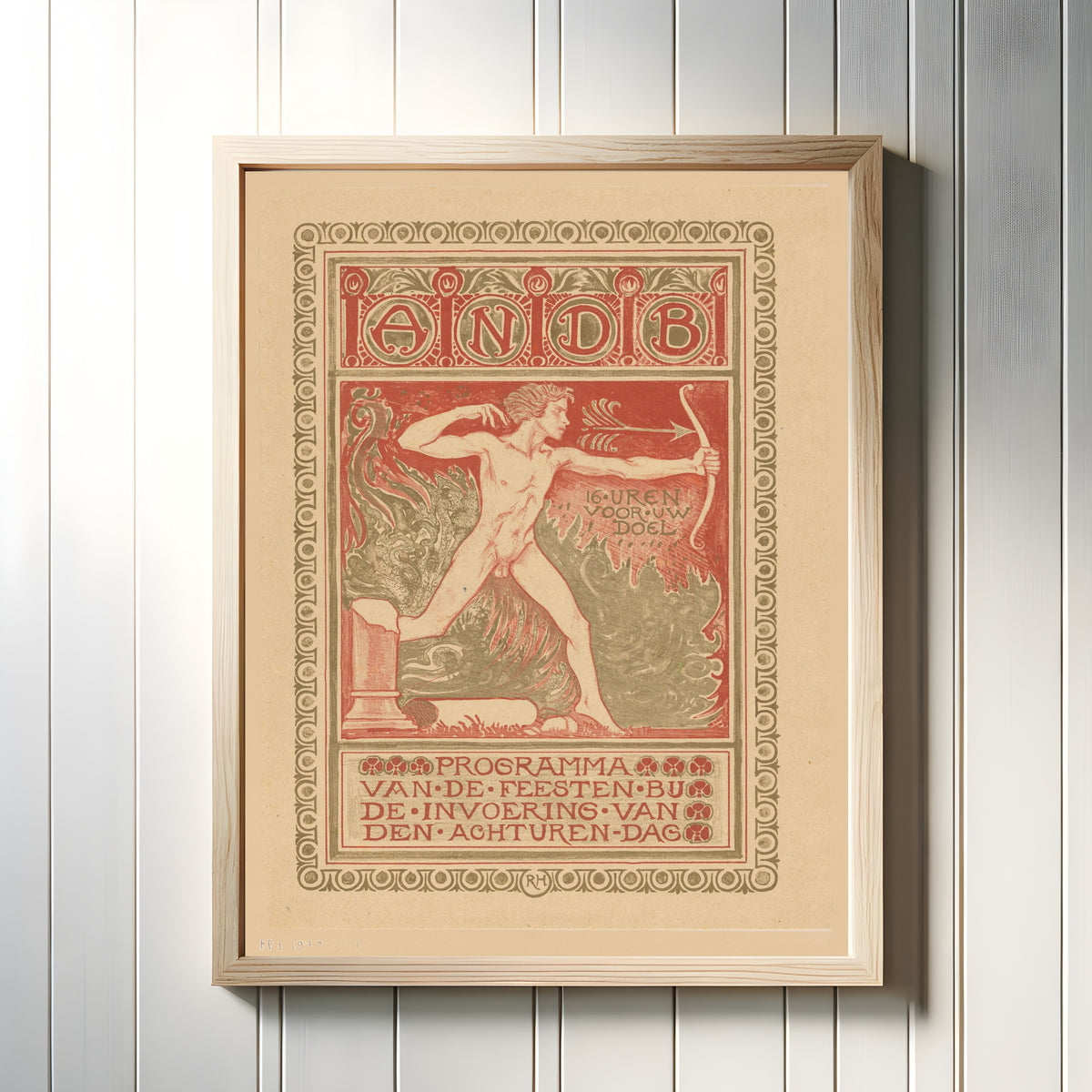 Framed art print of Omslagontwerp Feestprogramma ANDB achturendag [Cover design… by Richard Roland Holst, in a light wood frame on a white panelled wall