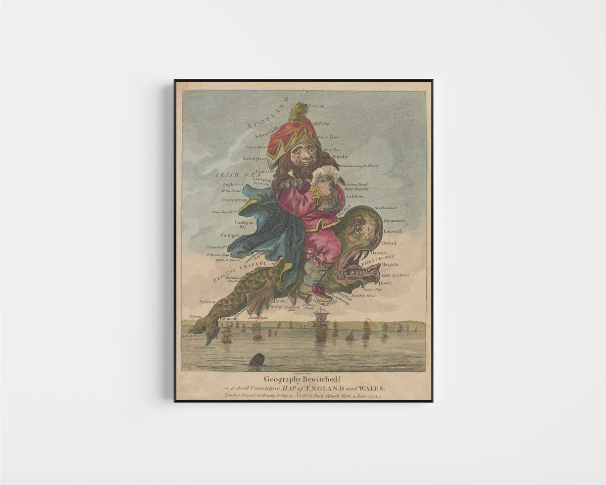 Framed art print of Geography Bewitched! A Droll Caricature Map of England and Wales by Robert Dighton, in a slim black frame on a plain white wall