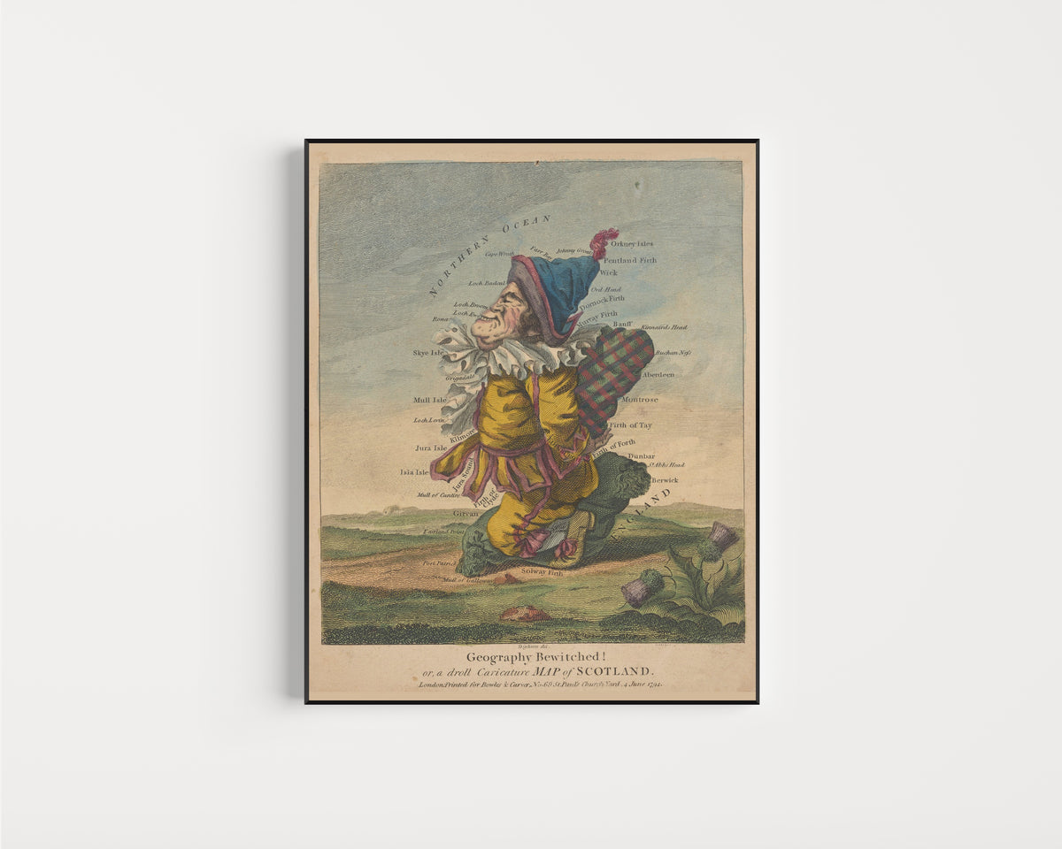 Framed art print of Geography Bewitched! Or, a Droll Caricature Map of Scotland by Robert Dighton, in a slim black frame on a plain white wall