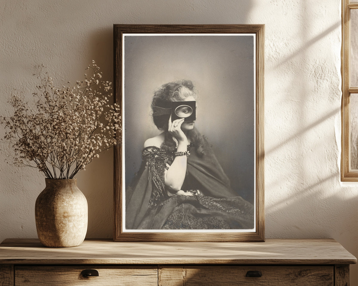 Framed art print of Scherzo di Follia by Pierre-Louis Pierson, in a dark wood frame leaning on a rustic console beside dried flowers