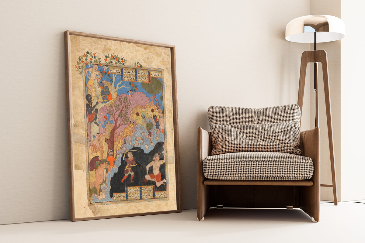 Rustam Slays the White Div by Shahnameh (Firdausi) — framed and leaning against a wall beside an armchair and a floor lamp