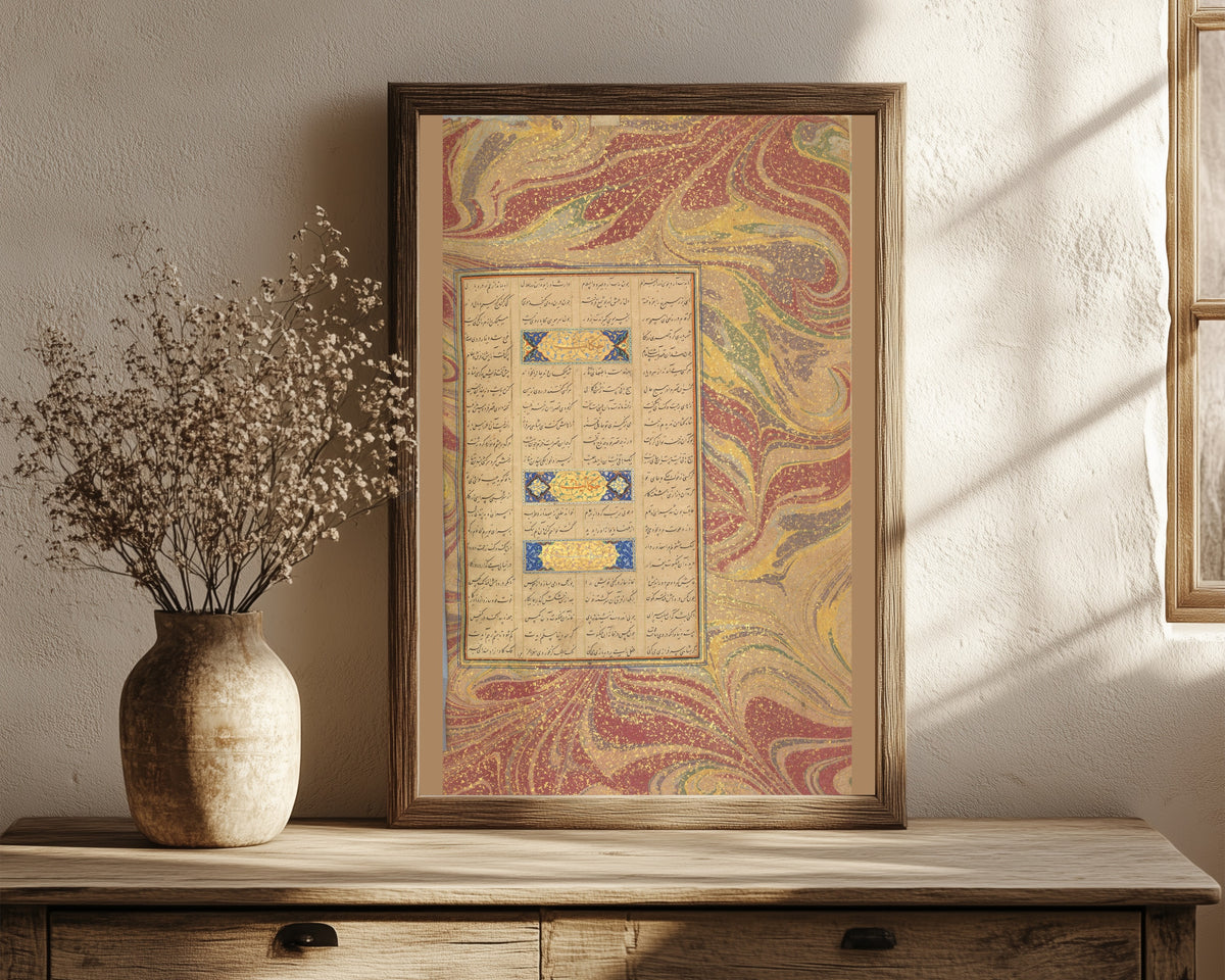 Framed art print of Page of Calligraphy from a Mantiq… by Sultan 'Ali al-Mashhadi, in a dark wood frame leaning on a rustic console beside dried flowers