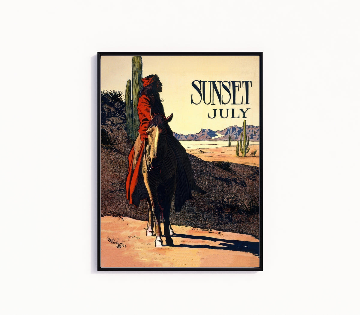 Framed art print of Sunset Magazine (July 1904) by Maynard Dixon, in a slim black frame on a plain white wall