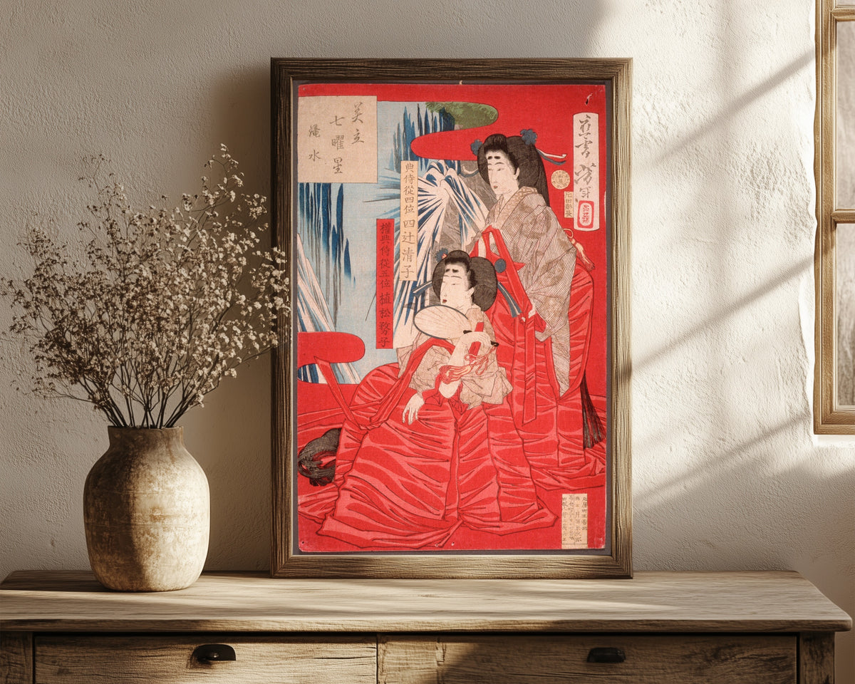 Framed art print of Cascading Water by Tsukioka Yoshitoshi, in a dark wood frame leaning on a rustic console beside dried flowers