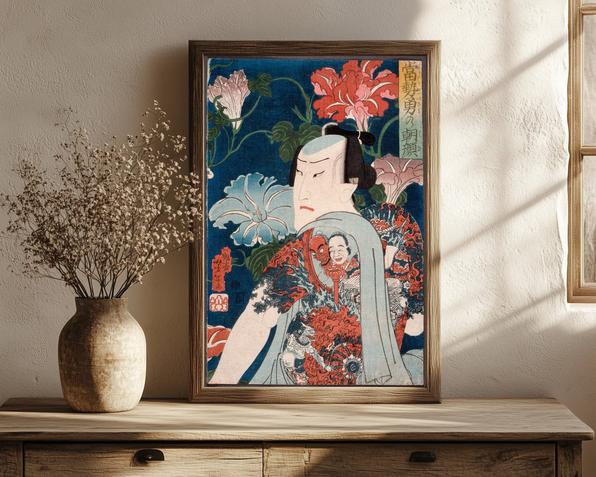 Framed art print of Modern Gallants with Morning Glories by Tsukioka Yoshitoshi, in a dark wood frame leaning on a rustic console beside dried flowers