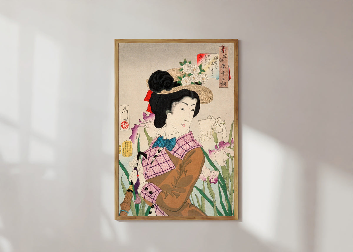 Framed art print of Preparing to Take a Stroll; The Wife of a Nobleman of the Meiji Period by Tsukioka Yoshitoshi, in a light wood frame on a sunlit white wall