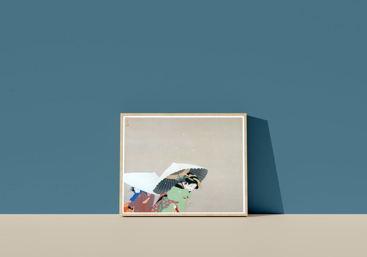 Framed art print of Large Snowflakes by Uemura Shōen, in a light wood frame leaning on a blue wall