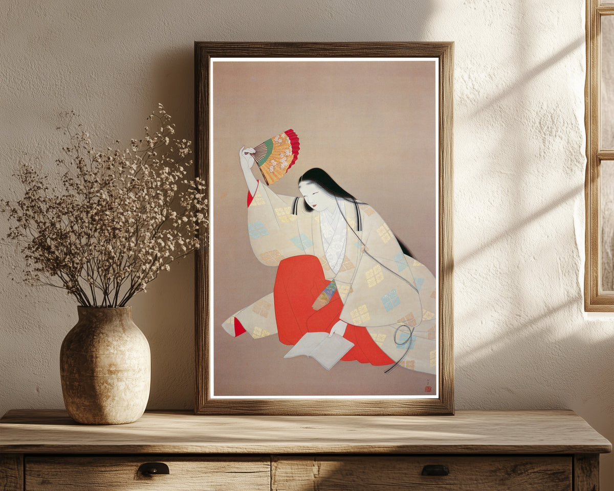 Framed art print of Ono no Komachi by Uemura Shōen, in a dark wood frame leaning on a rustic console beside dried flowers