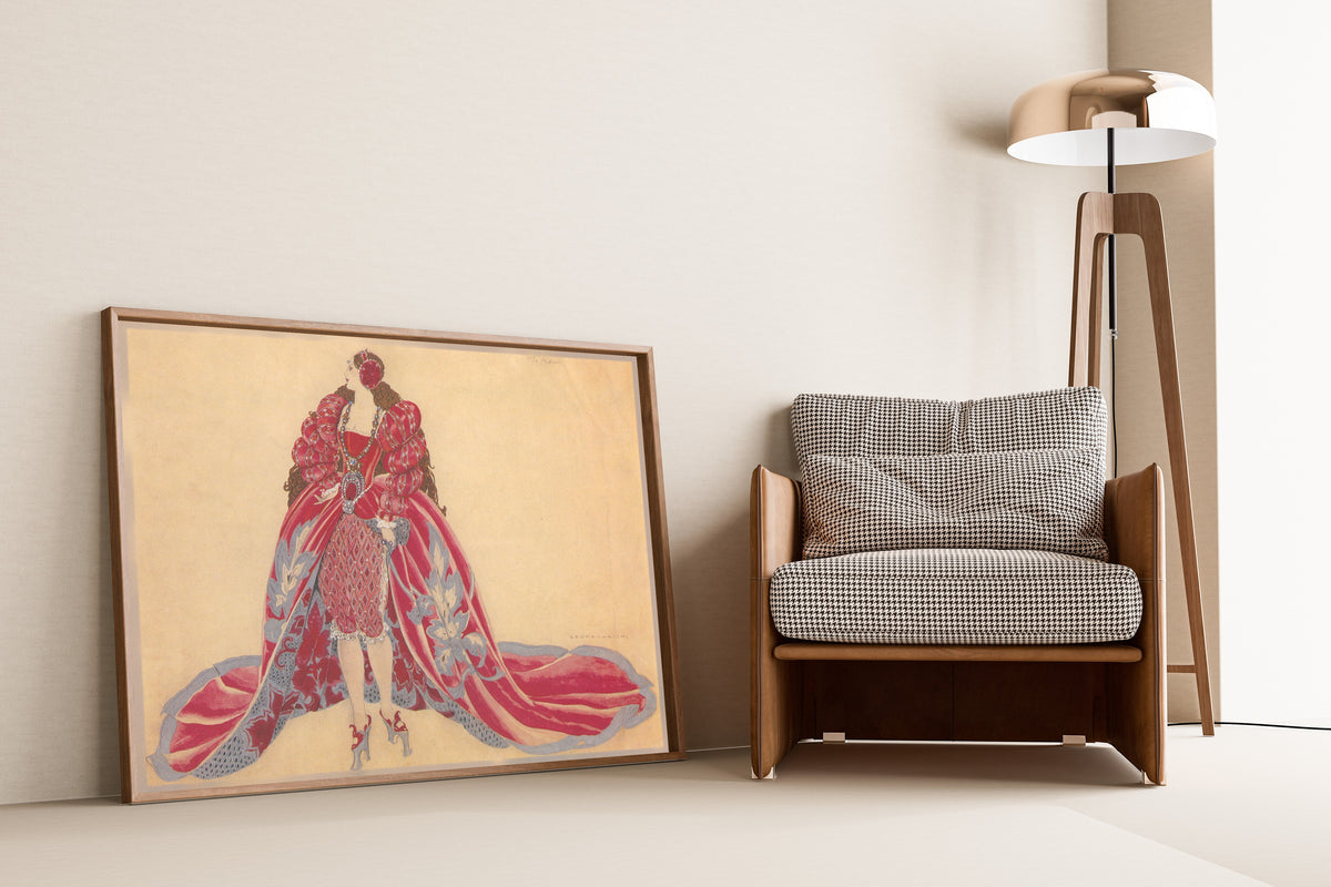 Costume Titien by Umberto Brunelleschi — framed and leaning against a wall beside an armchair and a floor lamp