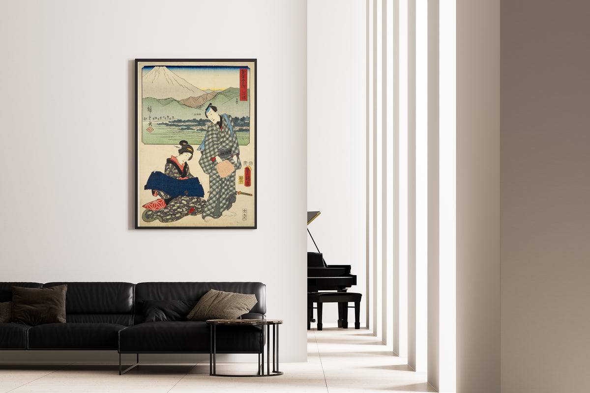 Fifty-three Stations by Two Brushes: Numazu by Utagawa Hiroshige & Utagawa Kunisada — framed on the wall of a minimal living room