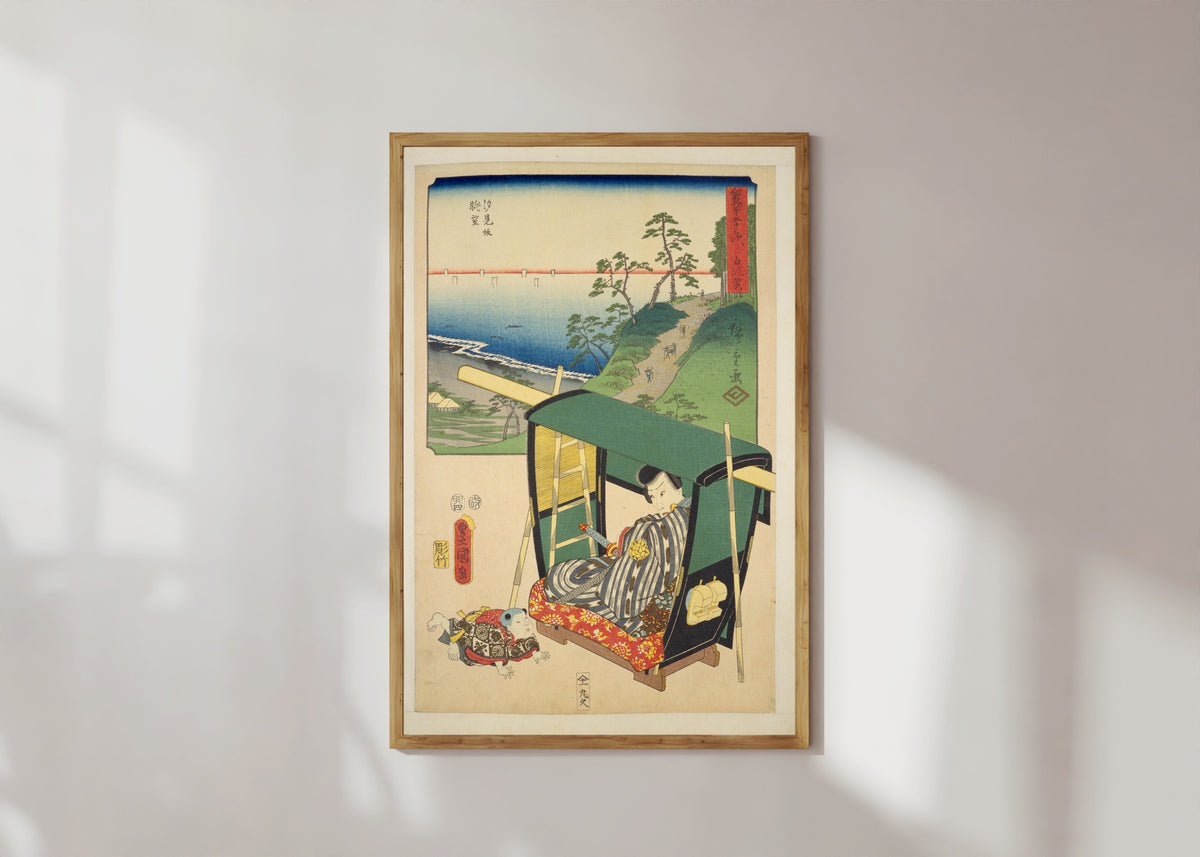 Framed art print of Fifty-three Stations by Two Brushes: Shirasuka by Utagawa Hiroshige & Utagawa Kunisada, in a light wood frame on a sunlit white wall