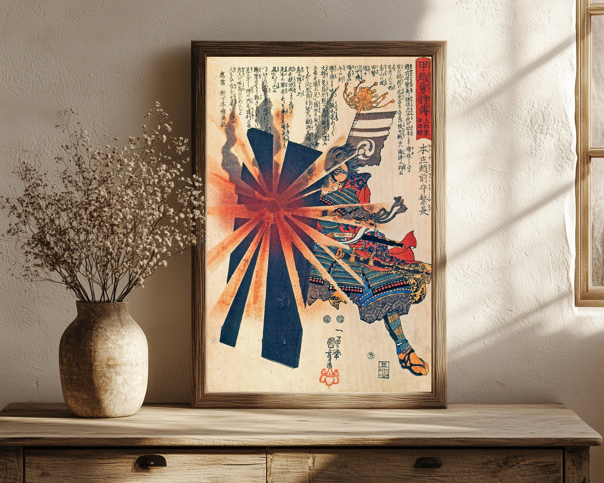 Framed art print of Honjō Shigenaga Parrying an Exploding Shell by Utagawa Kuniyoshi, in a dark wood frame leaning on a rustic console beside dried flowers