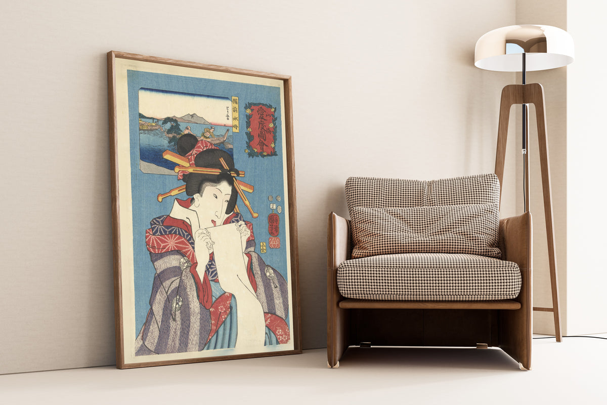 Jellyfish from Bizen Province by Utagawa Kuniyoshi — framed and leaning against a wall beside an armchair and a floor lamp