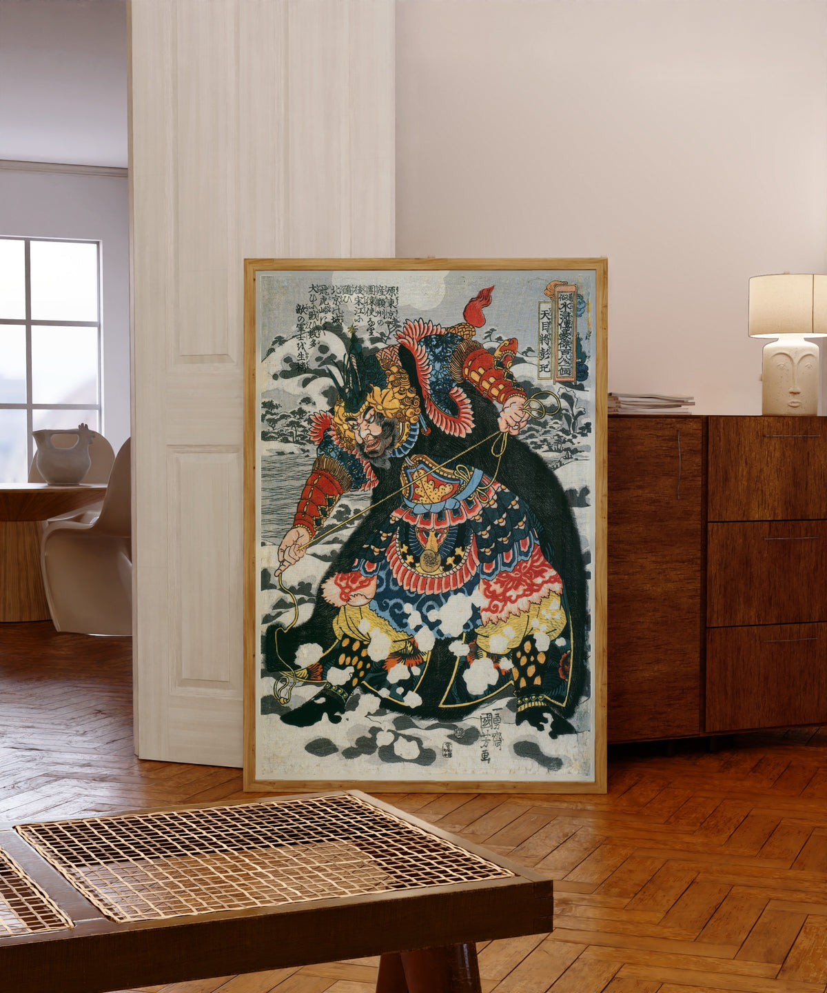 Framed art print of Tenmokushō Hōki (left panel) by Utagawa Kuniyoshi, in a light wood frame leaning in a warm room with a parquet floor