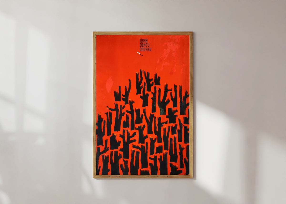 Framed art print of The Price of One Match by V. Strimaitis, in a light wood frame on a sunlit white wall