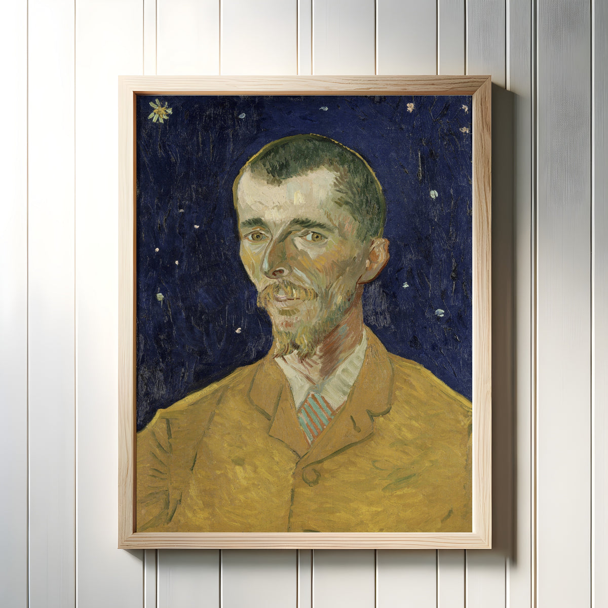 Framed art print of Eugène Boch (The Poet) by Vincent van Gogh, in a light wood frame on a white panelled wall