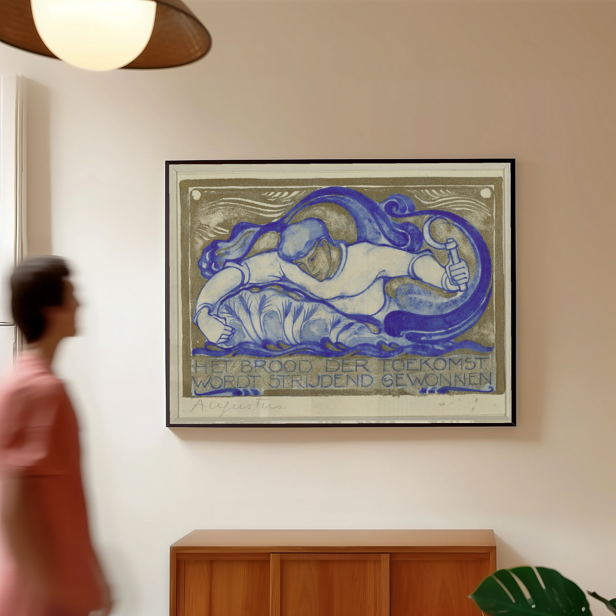 Framed art print of Het brood der toekomst wordt strijdend gewonnen, augustus [The… by Willem Arondéus, in a slim black frame on a warm wall in a sunlit room