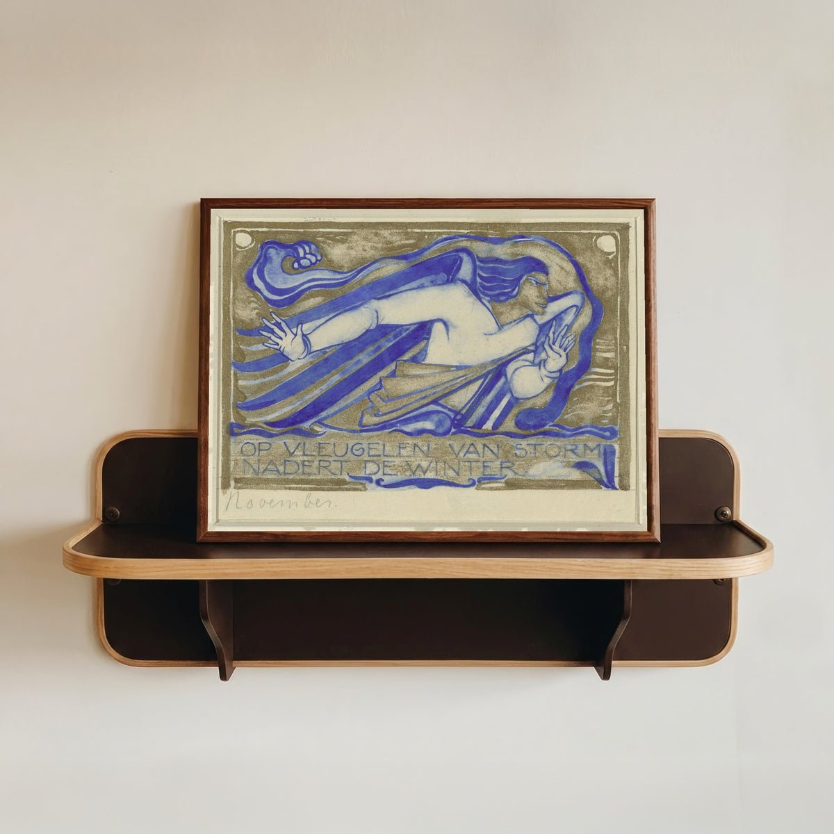 Framed art print of Op vleugelen van storm nadert de winter, november [On wings of storm… by Willem Arondéus, in a dark wood frame resting on a wall shelf