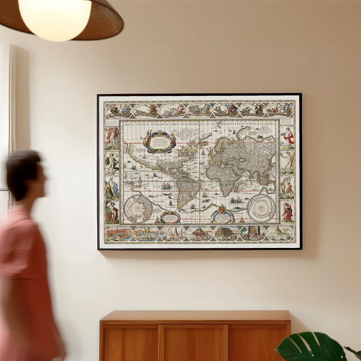 Framed art print of Nova Totius Terrarum Orbis Geographica ac Hydrographica… by Willem Janszoon Blaeu, in a slim black frame on a warm wall in a sunlit room