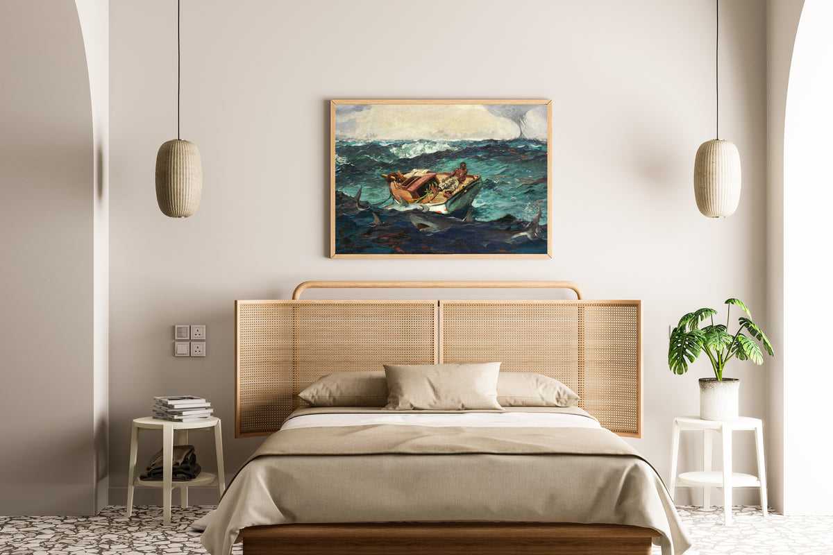 The Gulf Stream by Winslow Homer — framed above a cane-headboard bed