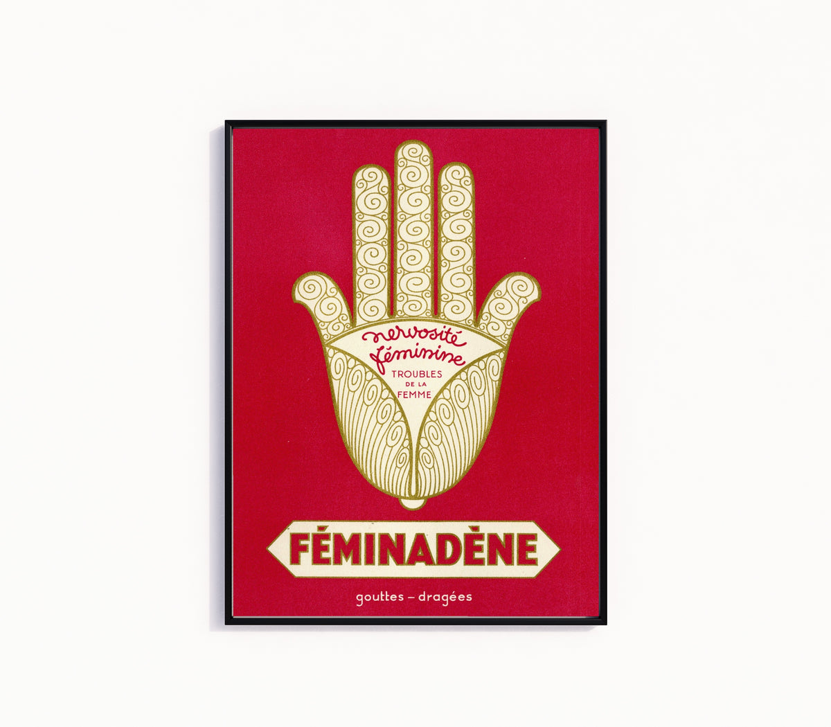 Framed art print of Vintage French Pharmaceutical Poster Print in Red, in a slim black frame on a plain white wall